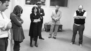 The band prays together before each concert