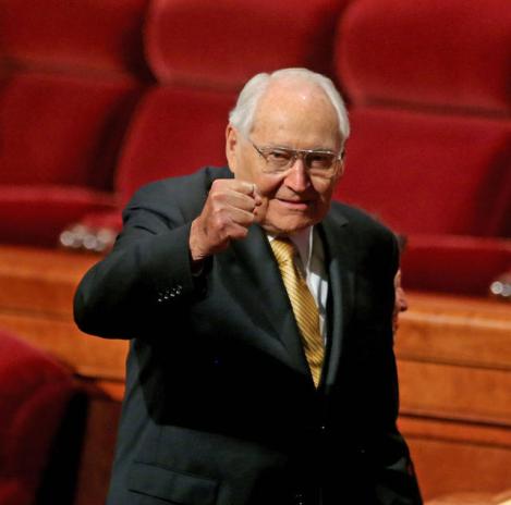 Elder L. Tom Perry giving a victorious fist pump to the crowd, April 2013
