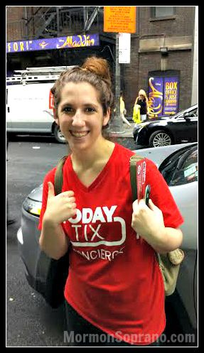 Our smiling TodayTix rep waiting with our tickets