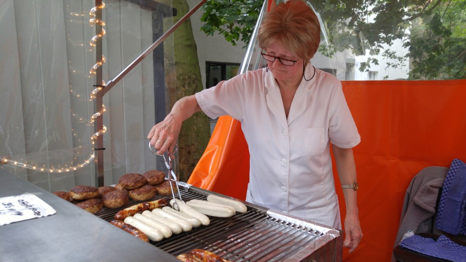 This cute Germany lady was all business with her brats, and they were cooked to perfection!