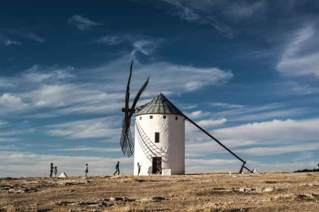 white and black windmill building